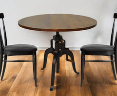 Adjustable Height Brown And Black Solid Wood And Iron Pedestal Base Round Top Dining Table By Homeroots