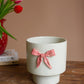 Ceramic Flower Pot With Pink Bow (Min 2) By Kalalou