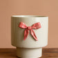 Ceramic Flower Pot With Pink Bow (Min 2) By Kalalou