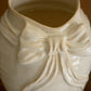 White Ceramic Vase With Bow By Kalalou