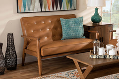 Baxton Studio Sorrento Mid-Century Modern Tan Faux Leather Upholstered and Walnut Brown Finished Wood Loveseat