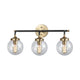 Boudreaux 3-Light Vanity Lamp in Matte Black and Antique Gold with Sphere-shaped Glass ELK Lighting | Vanity Light | Modishstore