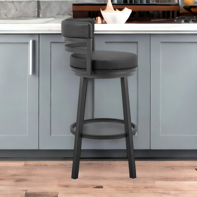 30" Black Faux Leather And Iron Swivel Low Back Bar Height Bar Chair With Footrest By Homeroots | Bar Stools | Modishstore