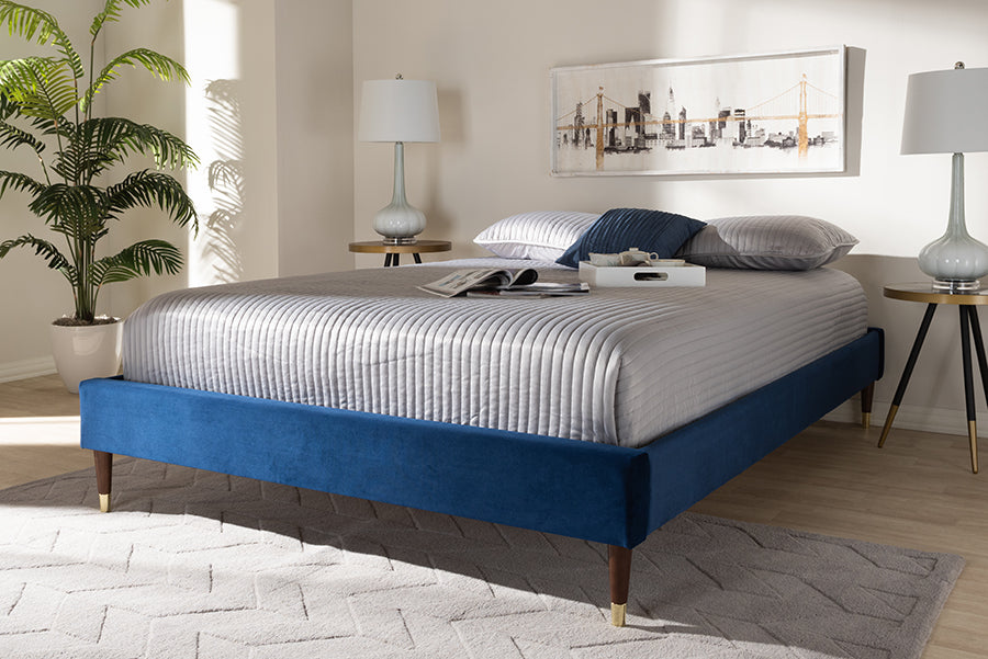 Baxton Studio Volden Glam and Luxe Navy Blue Velvet Fabric Upholstered Queen Size Wood Platform Bed Frame with Gold-Tone Leg Tips | Modishstore | Beds