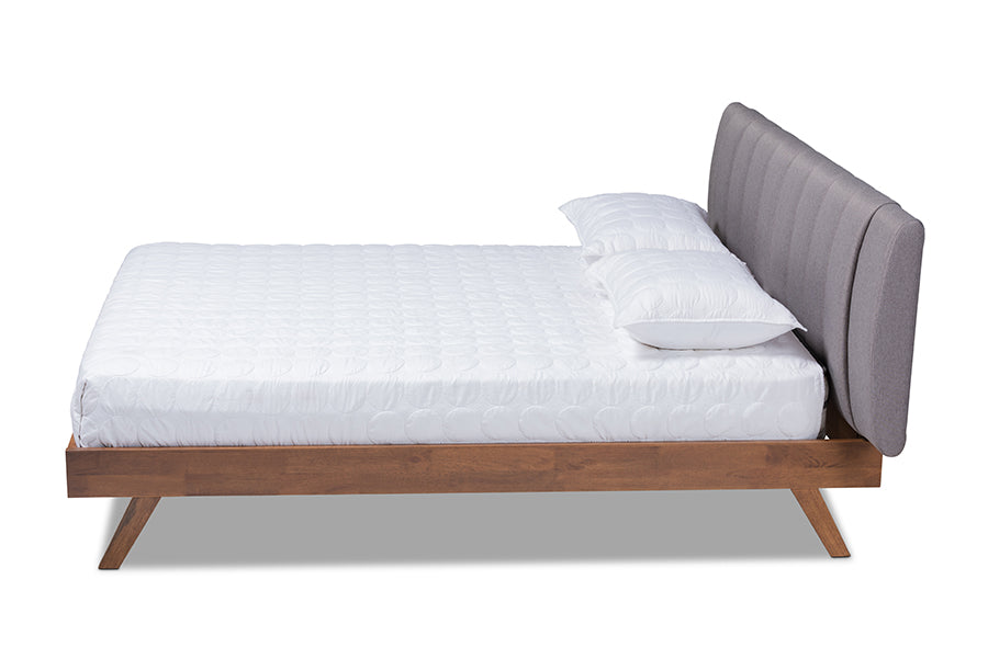 baxton studio brita mid century modern grey fabric upholstered walnut finished wood king size bed | Modish Furniture Store-3