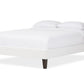 baxton studio lancashire modern and contemporary white faux leather upholstered queen size bed frame with tapered legs | Modish Furniture Store-4