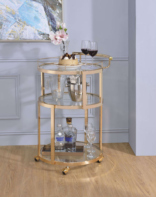 Three Tiered Metal Serving Cart With Glass Inserted Shelves And Curved Side Handle, Gold By Benzara | Bar Carts |  Modishstore 