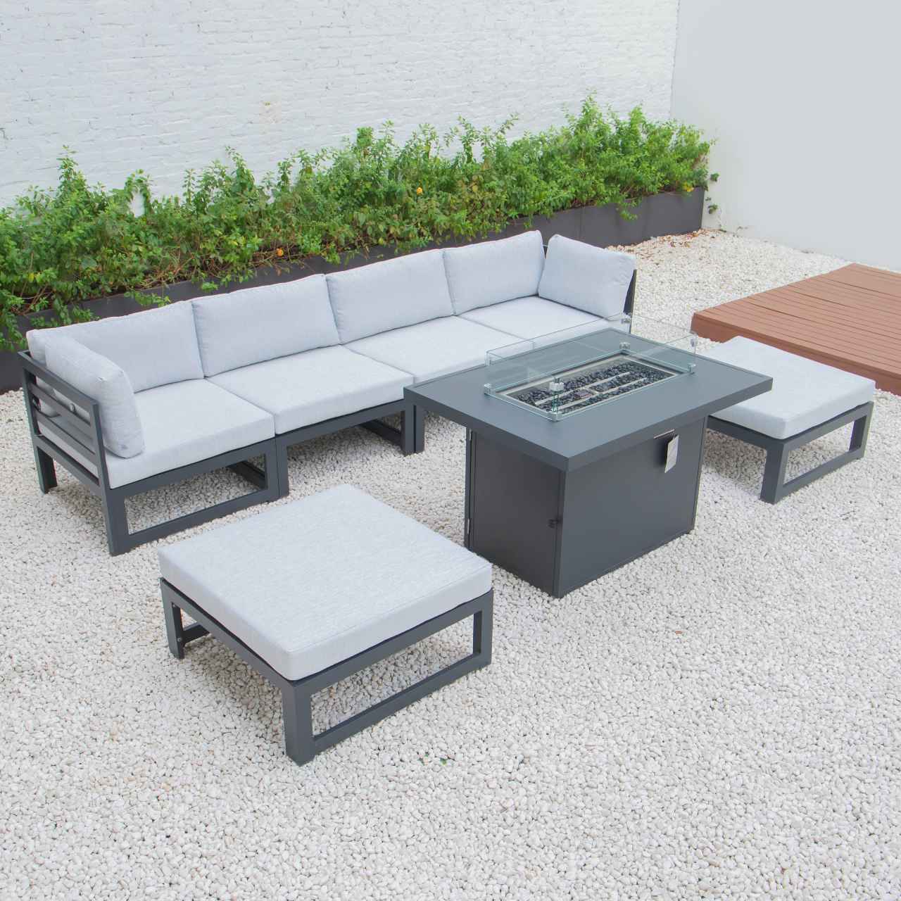 LeisureMod Chelsea 7-Piece Patio Ottoman Sectional And Fire Pit Table Black Aluminum With Cushions | Outdoor Sofas, Loveseats & Sectionals | Modishstore - 45