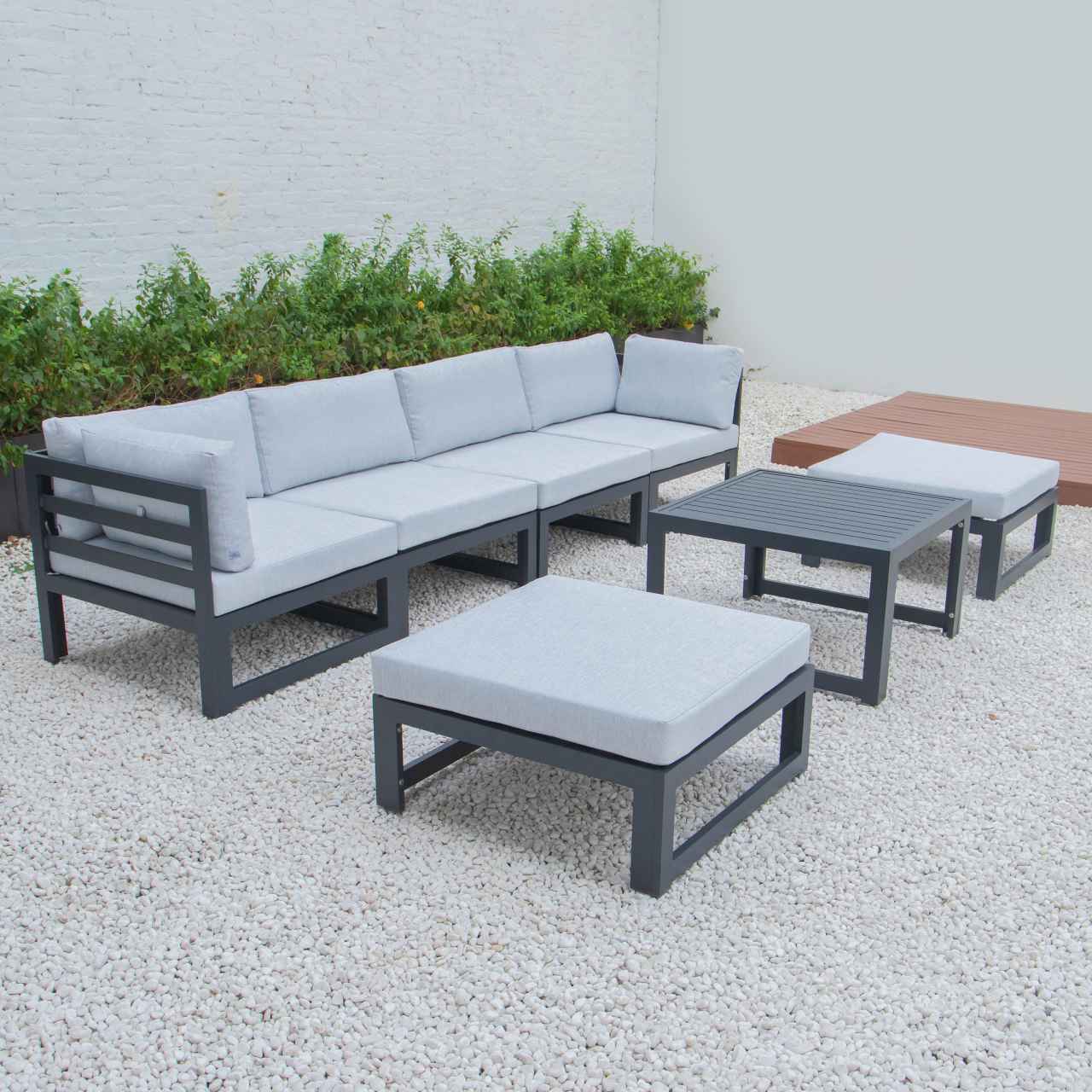 LeisureMod Chelsea 7-Piece Patio Ottoman Sectional And Coffee Table Set Black Aluminum With Cushions | Outdoor Sofas, Loveseats & Sectionals | Modishstore - 23