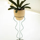 Large Ivory And Black Clay Pot With Wire Squiggle Base By Kalalou | Planters, Troughs & Cachepots | Modishstore