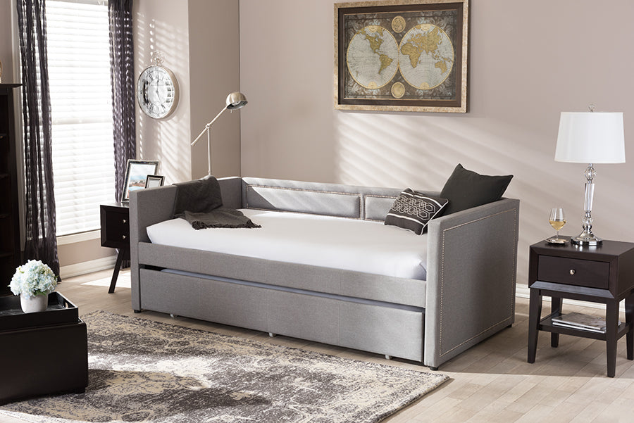 Baxton Studio Raymond Modern and Contemporary Grey Fabric Nail Heads Trimmed Sofa Twin Daybed with Roll-Out Trundle Guest Bed | Modishstore | Beds